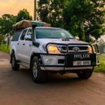 Budget Travel In Uganda Using a Rooftop Tent Car